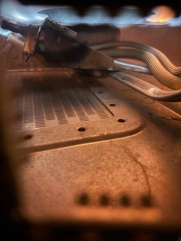 Responded to no hot water complaint at residential property. Upon arrival, inspected tanked water heater located in utility closet. Performed diagnostic evaluation of unit and associated plumbing connections. Examined copper supply lines, pressure relief valve, and gas control components. Assessed water heater's operational status and identified cause of hot water failure. Documented existing conditions including visible wear on piping system, connection points, and water heater cabinet. Provided repair recommendations to restore hot water service to the home.