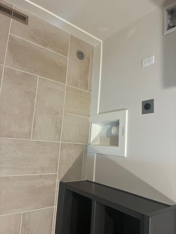 Responded to service call for gas line installation for dryer appliance. Completed installation of gas supply line with proper fittings and connections to accommodate dryer hookup. Verified all connections for proper seal and tested system for leaks using approved detection methods. Documented installation with photographs showing completed work in utility area with exposed mechanical systems and ductwork visible in attic space.