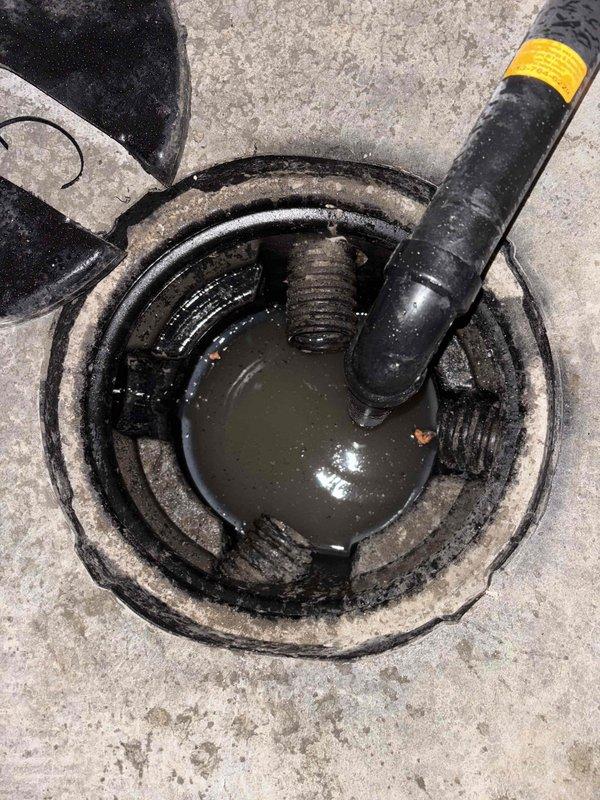 Installed a dual sump pump system featuring a 1/2 HP energy-efficient permanent split capacitor primary pump with 3,540 GPH capacity at 10 ft. lift and a backup pump system rated at 1,850 GPH at 10 ft. lift. Mounted the submersible primary pump in the existing sump basin with discharge piping, installed the backup motor assembly with control module in the corner, and connected all electrical components including the floor-mounted control box with indicator lights to ensure proper operation and automatic switching between primary and backup systems.