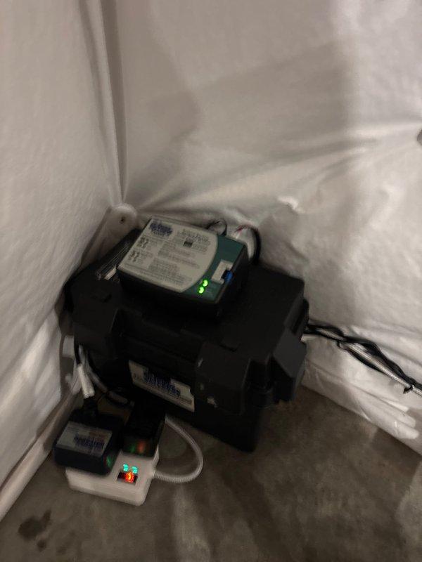 Installed a dual sump pump system featuring a 1/2 HP energy-efficient permanent split capacitor primary pump with 3,540 GPH capacity at 10 ft. lift and a backup pump system rated at 1,850 GPH at 10 ft. lift. Mounted the submersible primary pump in the existing sump basin with discharge piping, installed the backup motor assembly with control module in the corner, and connected all electrical components including the floor-mounted control box with indicator lights to ensure proper operation and automatic switching between primary and backup systems.