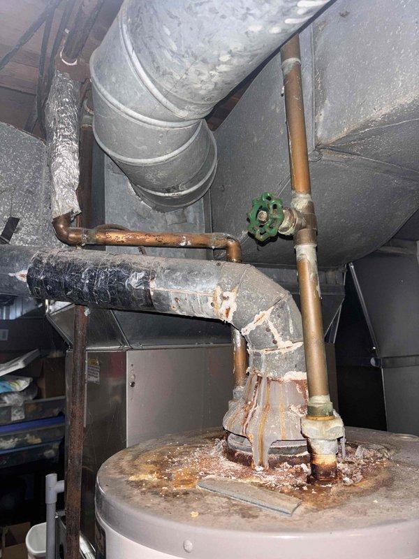 Responded to service call for clogged kitchen sink. Upon arrival, conducted inspection of plumbing system and documented existing conditions of water heater and associated piping in mechanical room, noting signs of corrosion on copper lines and aging infrastructure. Successfully cleared kitchen sink blockage and restored proper drainage function.