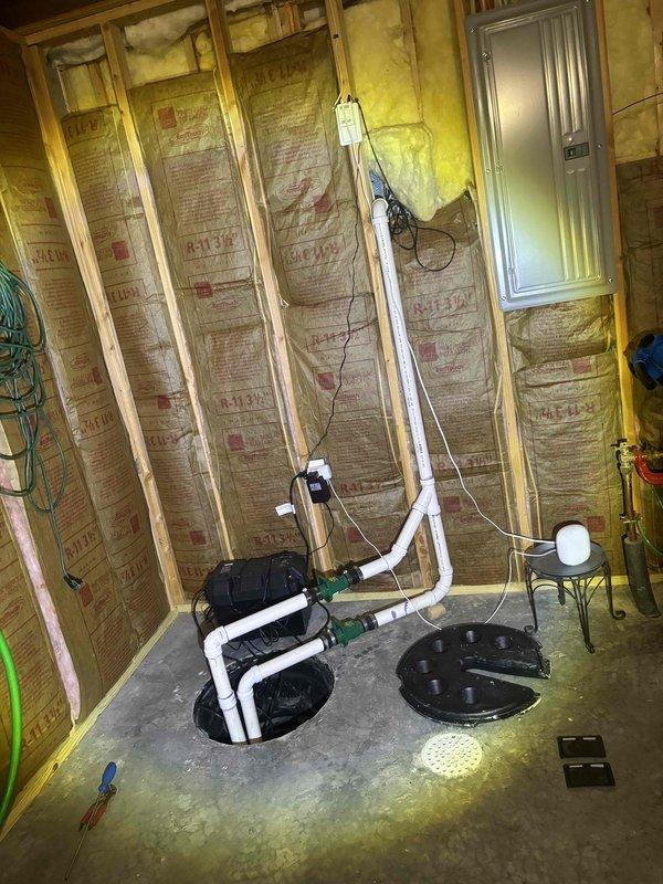 Responded to service call for sump pump activating but immediately shutting off. Upon inspection, found existing sump pump system in unfinished basement with corroded pump motor showing significant age-related deterioration, rust spots, and surface oxidation. Diagnosed pump failure due to worn motor components preventing proper operation cycle. Performed system evaluation of basin, discharge piping, and electrical connections. Replaced failed sump pump unit with new assembly, ensuring proper float switch operation and motor function. Tested system through multiple activation cycles to verify continuous operation and proper water discharge through existing PVC piping. Confirmed electrical connections secure and system operational.