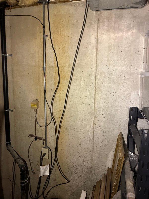 Performed scheduled maintenance on HydroJet tanked water heater located in basement utility area. Conducted comprehensive inspection of unit including water connections, pressure relief valve, and drainage system. Verified proper operation of all components and documented current condition of installation with photographic records.