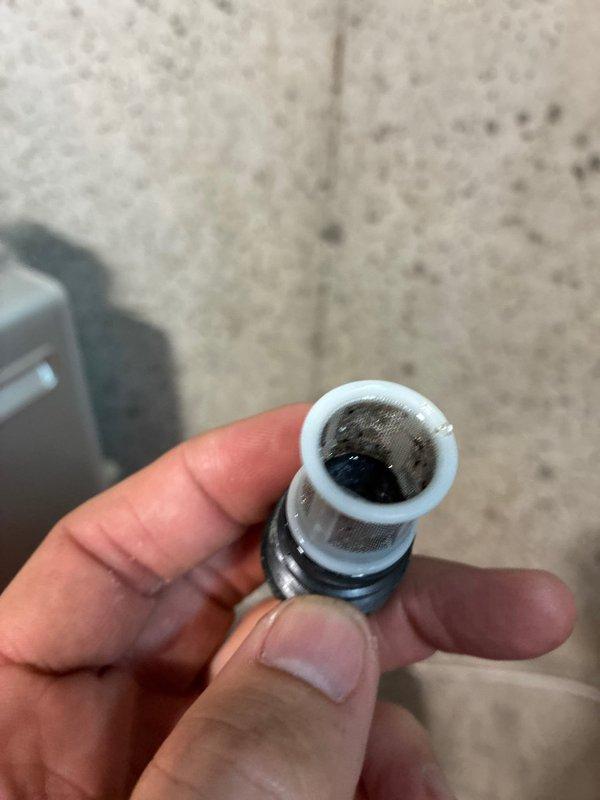 Responded to service call for tankless water heater experiencing operational issues in basement installation. Upon inspection of the 5-6 year old unit, identified severely clogged inlet filter screen causing reduced water flow and performance problems. Removed and cleaned the contaminated filter assembly, which showed significant accumulation of sediment and debris. Performed comprehensive internal inspection of the unit, examining the heat exchanger, gas combustion components, electrical connections, and water supply lines. Verified proper operation of all safety controls, ignition system, and flow sensors. Tested unit functionality following filter cleaning and confirmed restoration of proper hot water delivery and temperature consistency.