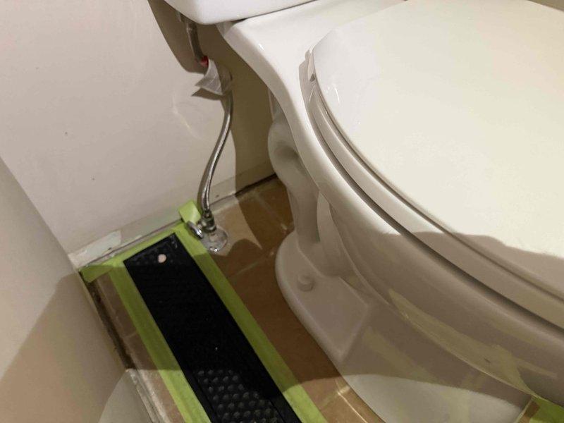 Successfully installed customer-supplied toilet in bathroom with beige tile flooring. Installation included new wax ring seal and reconnection of water supply line to ensure proper function and prevent leaks. Toilet was tested for proper flush operation and verified no water leakage at base or supply connection upon completion.