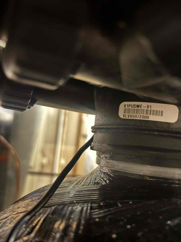 Performed carbon media replacement on Puronics water softening system. Removed existing carbon filter media from treatment tank and recharged unit with fresh activated carbon to restore optimal water filtration and taste/odor removal capabilities. Verified control valve settings and programming on digital controller. Inspected system plumbing connections, including PVC inlet/outlet piping, for proper operation and absence of leaks. Tested system cycling and regeneration functions to ensure proper performance. System returned to full operational status with improved water treatment efficiency.
