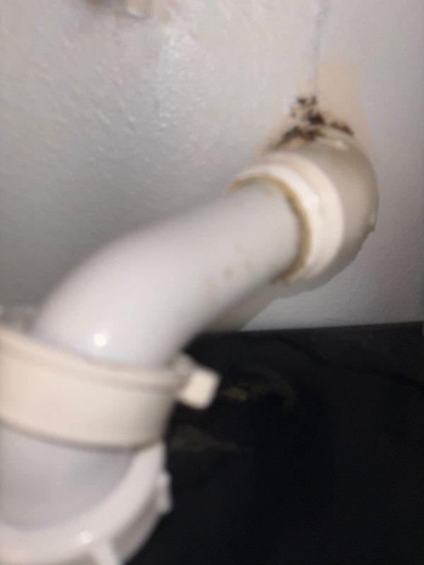 Responded to service call for two separate plumbing issues in residential bathrooms. Successfully replaced defective cartridge in master shower valve assembly to restore proper temperature control and water flow. Addressed leaking sink in hall bathroom by inspecting drain assembly and supply line connections beneath vanity, identifying source of leak at PVC coupling joint, and performing necessary repairs to eliminate water seepage and restore watertight seal.