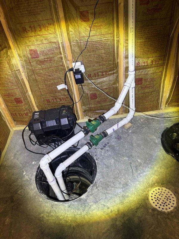 Successfully installed customer-supplied sump pump system in basement sump basin. Mounted pump unit with appropriate PVC discharge piping, including shutoff valves for maintenance access, and secured all electrical connections. System tested and verified operational, with proper water level activation and discharge flow through newly installed piping configuration.