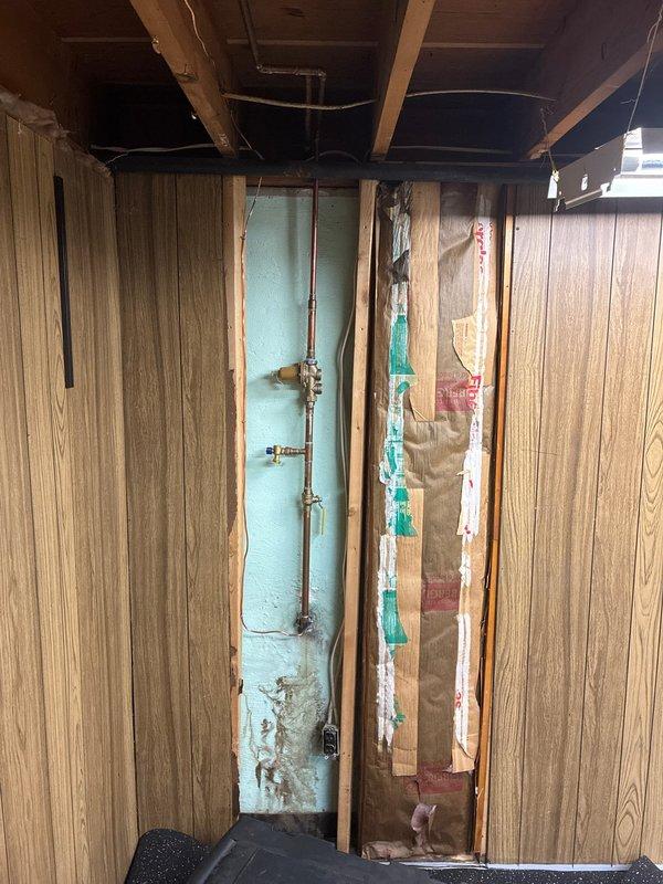 Completed plumbing estimate for replacement of 15-year-old water heater located in basement. The existing system is currently operational but has reached end of expected service life. Assessed installation location, existing copper supply lines, drainage configuration, and venting requirements for proper replacement specifications.