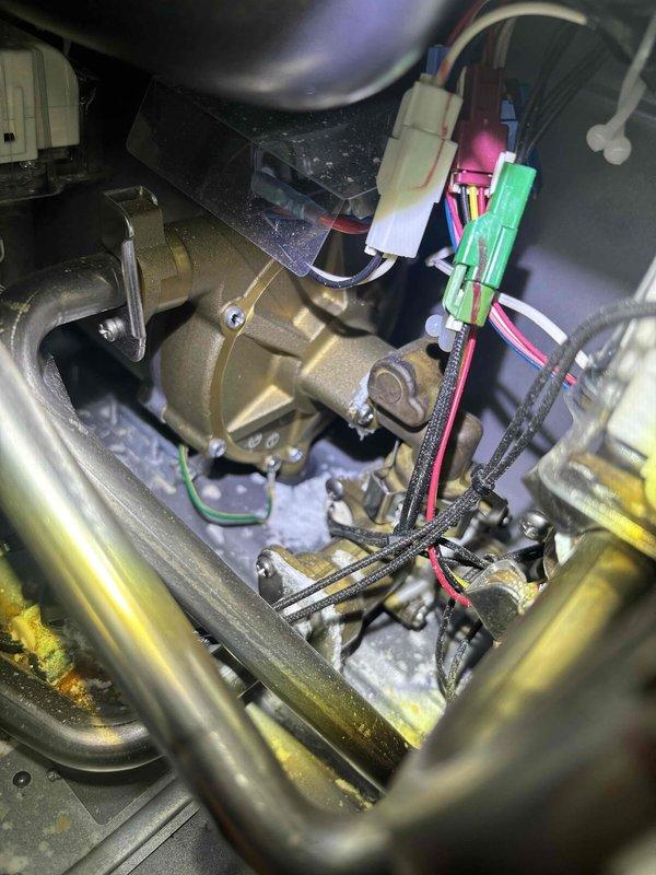 Completed routine plumbing maintenance inspection of HVAC system components, including examination of gas valve assembly, control module connections, and associated piping. Inspected blower housing, heat exchanger manifold, electrical wiring harnesses, and valve connections; noted presence of condensation on interior surfaces and verified all mechanical fasteners and connection points were secure.