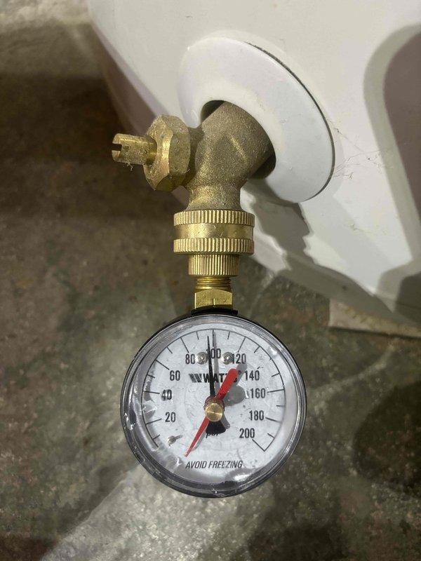 Completed preventative plumbing maintenance inspection on residential water system. Verified water pressure reading at exterior hose bib, which registered approximately 100 PSI on gauge. Inspected interior piping and identified mineral deposit buildup on pipe walls, indicating potential hard water scaling that may require future attention to prevent flow restriction.