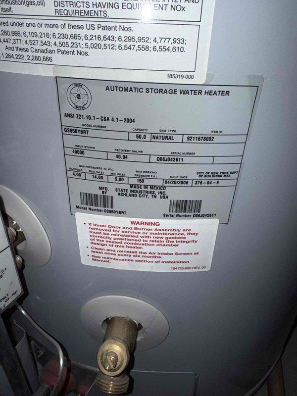 Responded to service call for kitchen sink drainage issue. Upon arrival, performed inspection of kitchen plumbing system and documented existing water heater installation in utility area. Water heater unit identified as 50-gallon natural gas automatic storage model (GS950YBRT) manufactured in 2006, with all safety labels and specifications intact. Addressed reported drainage problem through standard drain clearing procedures to restore proper flow to kitchen sink.
