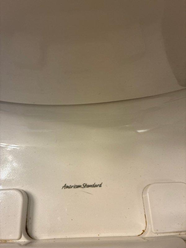 Responded to complaint of continuously running toilet with squeaking noise in main level bathroom. Upon inspection, identified American Standard toilet with faulty fill valve causing the reported symptoms. Replaced defective fill valve assembly to eliminate running water and squeaking sound. Also serviced condensate pump basin in utility area, removing accumulated mineral deposits and algae buildup from reservoir. Tested toilet flush cycle and verified proper fill valve operation with no leaks or unusual sounds. All systems restored to normal operation.