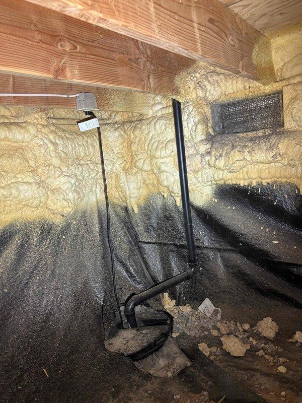 Completed plumbing maintenance inspection of crawl space and water heater installation. Inspected crawl space infrastructure including exposed floor joists, vapor barrier integrity, and plumbing penetrations; noted debris accumulation on moisture barrier requiring attention. Evaluated water heater condition, verified proper gas line connection with flexible yellow connector, confirmed adequate ventilation and clearances, and inspected water supply lines and discharge piping for proper installation and operation.