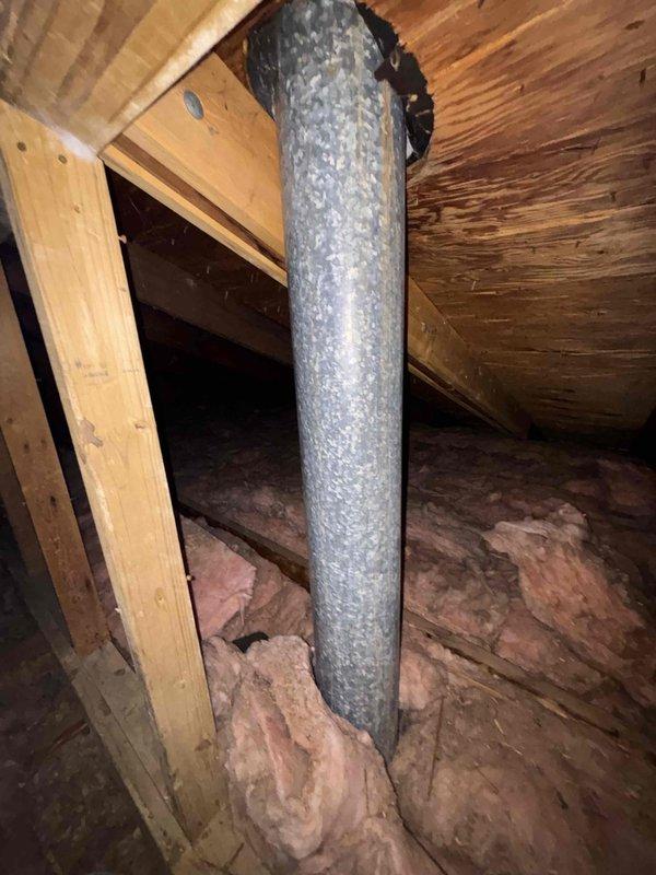 Performed seasonal cooling checkout on single HVAC unit located in attic space. Inspected Carrier model CNPVP36Z1ATA4BAA condensing unit and verified operational status. Checked condensation drain line routing near water heater to ensure proper drainage and confirm no blockages or standing water present. Unit found in satisfactory operating condition with adequate airflow through ductwork and proper insulation maintained throughout attic installation.