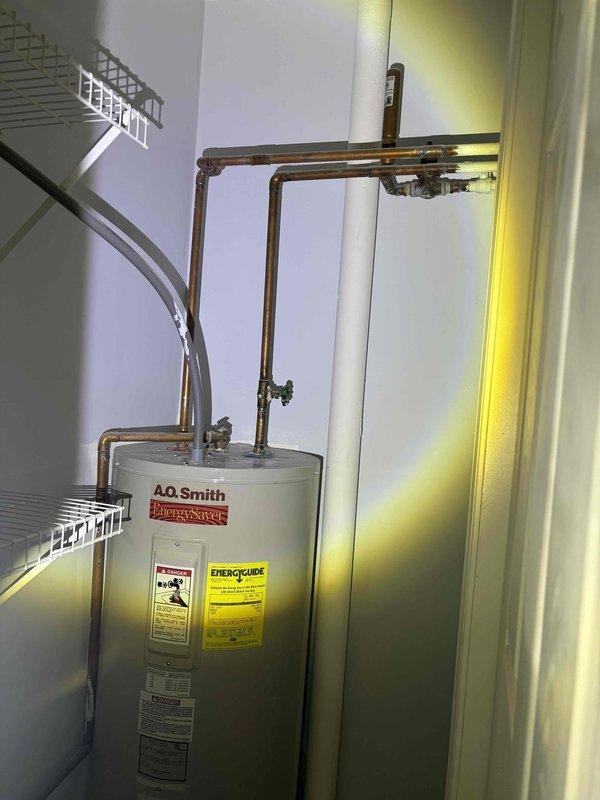 Completed comprehensive whole-home plumbing inspection as part of promotional campaign. Inspected A.O. Smith Energy Saver water heater installation, verified proper copper piping connections, assessed condition of supply lines and fittings, and examined HVAC system components including sensors and controls. All plumbing systems found to be in proper working order with no deficiencies or repairs required at time of inspection.