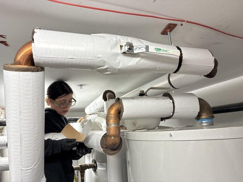 Completed commercial gas piping installation in mechanical room serving multiple HVAC units. Installed and insulated gas distribution system with proper routing, support brackets, and connections to four heating/cooling units, ensuring all piping met code requirements for commercial applications. System was pressure tested and verified operational with all connections properly secured and insulated per specifications.