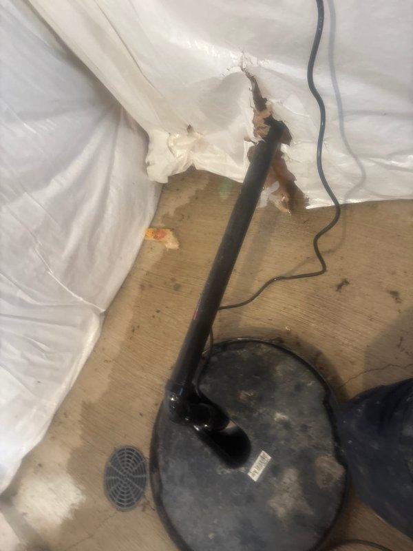 Responded to service call for non-functioning sump pump in basement. Upon arrival, inspected existing sump pump system and determined unit had failed and required replacement. Removed old sump pump from pit and installed new replacement pump unit. Connected discharge piping to existing PVC drainage system and verified proper electrical connections. Tested new pump operation to ensure proper activation and water discharge functionality. System restored to full working order with pump cycling correctly and effectively removing water from basin.