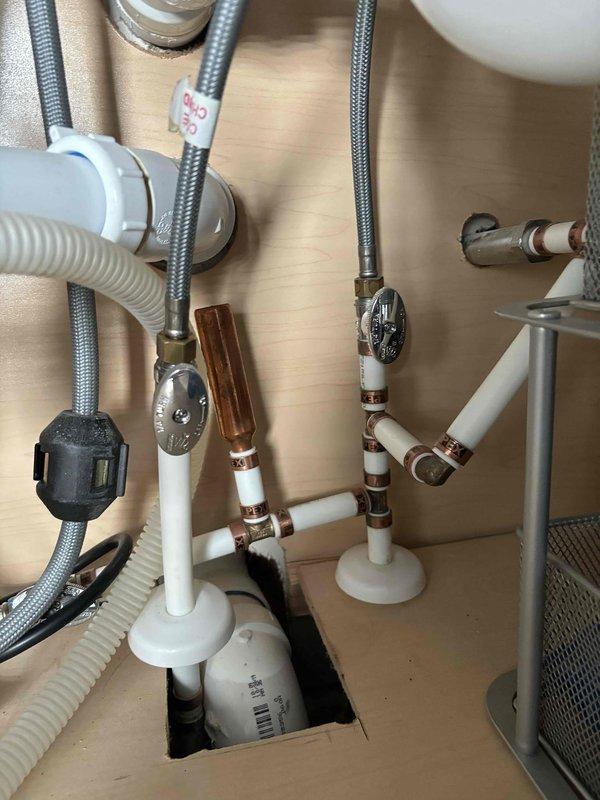 Completed plumbing maintenance visit to inspect and verify proper operation of bathroom sink faucet and associated supply and drainage systems. Tested water flow and pressure at chrome single-handle faucet, confirmed proper drainage through P-trap assembly, and inspected under-sink plumbing connections including flexible braided supply lines, shut-off valves, and PVC drain components to ensure all fixtures were functioning correctly without leaks.