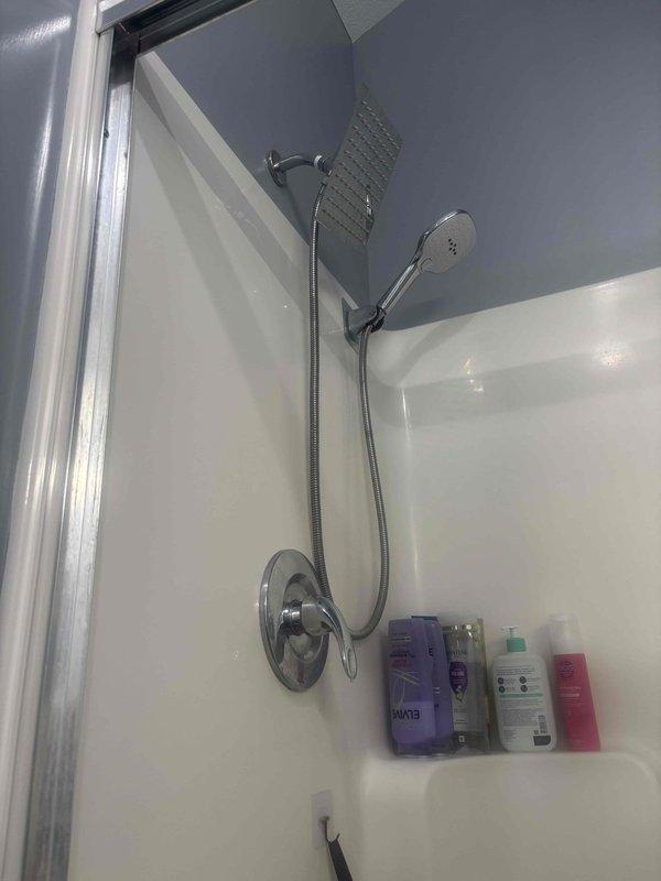 Completed replacement of two outdoor hose bibs and one shower control valve assembly. Installed new frost-free sillcocks with proper mounting hardware on exterior wood siding, including connection points compatible with existing hose attachments. Replaced shower mixing valve and trim kit with chrome finish single-handle unit, ensuring proper water temperature control and flow regulation. All fixtures tested for leaks, proper operation verified, and connections secured to manufacturer specifications.