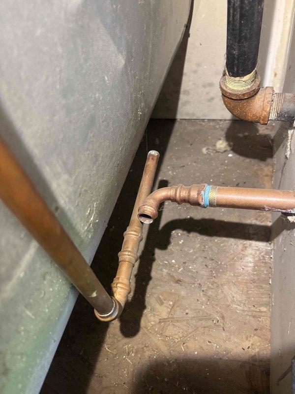 Responded to a main line repair for a failed hose bib supply line. Upon inspection, discovered the copper pipe connection to the exterior hose bib had separated, causing a complete line failure. Removed the damaged section of copper piping, fabricated new connections with proper fittings and soldered joints, and restored water supply to the hose bib. System tested and verified leak-free operation upon completion.