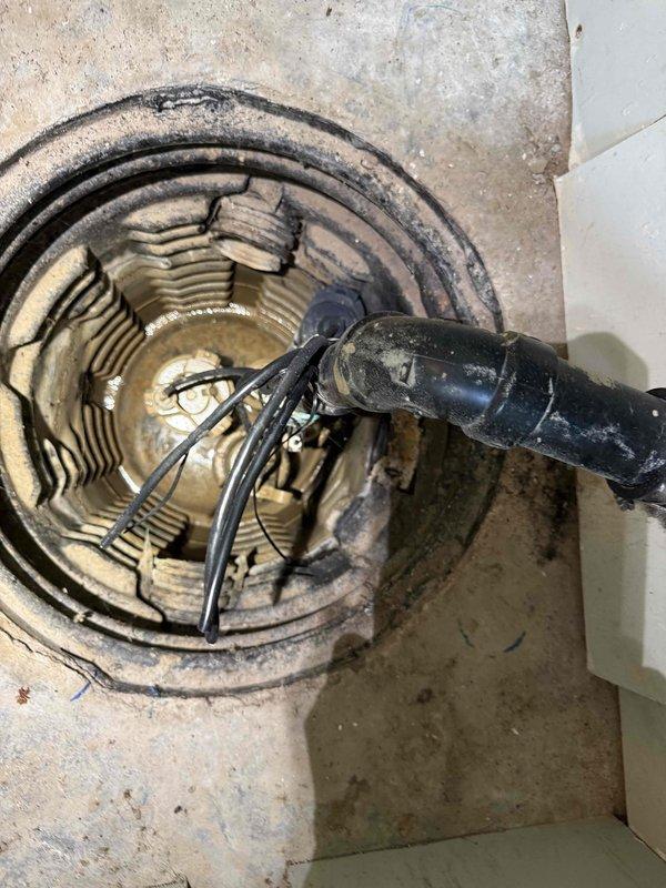 Installed a new 1/2 HP energy efficient permanent split capacitor (PSC) sump pump system with backup capabilities in basement floor basin. The primary pump provides 3,540 GPH capacity at 10 ft. lift and 4,400 GPH at 0 ft. lift, while the backup system delivers 1,850 GPH at 10 ft. lift and 2,500 GPH at 0 ft. lift. Integrated PUMPspy monitoring system with digital display for real-time pump performance tracking, connected all electrical wiring and discharge piping, and verified proper operation of both primary and backup pumps.