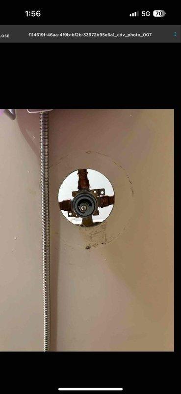 Responded to callback for previously repaired shower with no reported issues of old water discharge. Inspected shower valve assembly and verified proper operation of cartridge mechanism and water flow through showerhead. Documented condition of valve components and water heater system with photos to confirm all repairs functioning as intended.