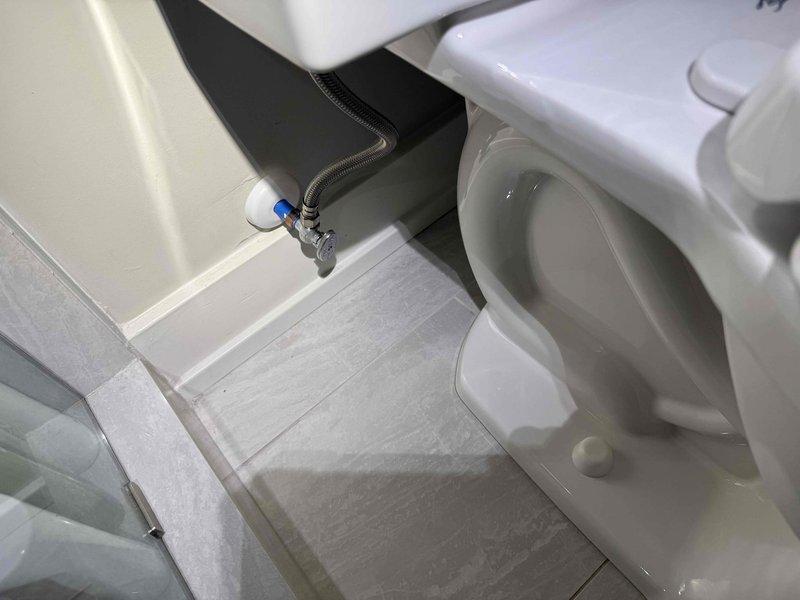 Performed plumbing maintenance on residential toilet system. Inspected internal tank components including flush valve assembly, fill valve mechanism, and refill tube connections. All components were functioning properly with flush valve, flapper, and ballcock assembly in good working condition. Verified proper water flow and tank refill operation.