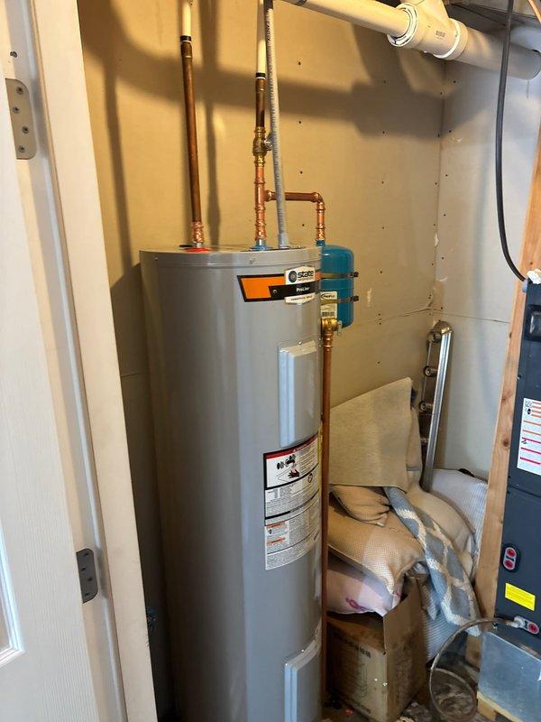 Successfully installed a 40-gallon electric water heater in the utility closet, connecting all copper supply lines and ensuring proper integration with the existing plumbing system. Installed a pressure regulator and expansion tank to protect the system from excessive pressure buildup and thermal expansion. Verified all connections for leaks, confirmed proper system pressure within safe operating parameters, and ensured all safety labels and specifications were visible for future reference.