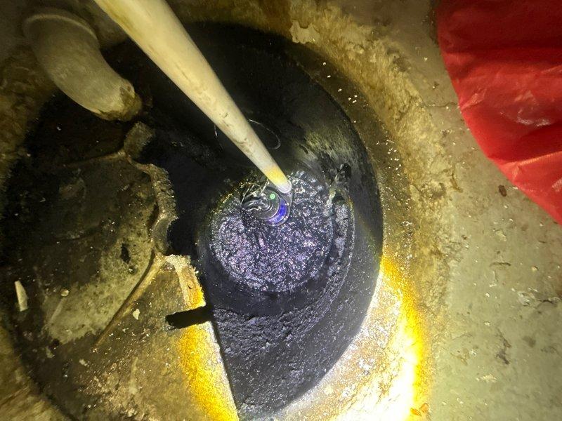 Installed customer-supplied sump pump in basement utility area, connecting discharge piping and electrical components to ensure proper drainage system operation. Basin was positioned in concrete floor with PVC discharge line routed appropriately, and pump was tested to verify functionality and water removal capacity. All connections were secured and system confirmed operational upon completion.