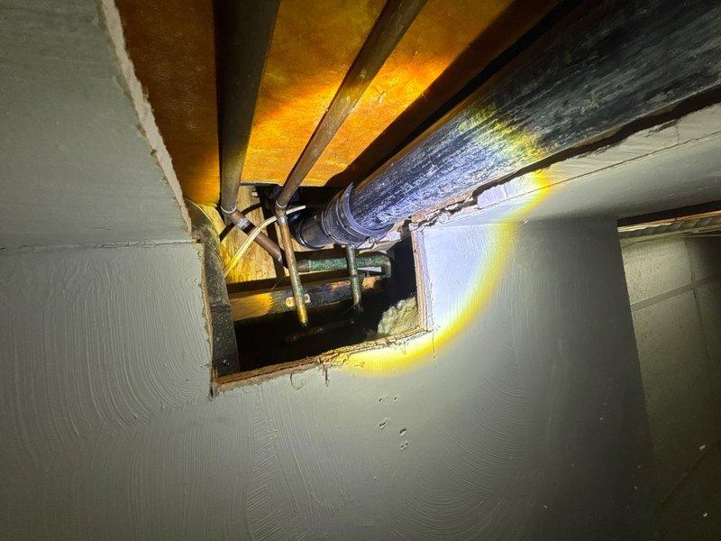 # Plumbing Maintenance Summary

Performed routine plumbing maintenance inspection in crawl space and mechanical room. Inspected exposed water supply lines with flexible braided metal connectors and brass fittings for proper connections and potential leaks. Examined PVC drainage piping and verified secure mounting of all plumbing components. Assessed condition of mechanical equipment connections and confirmed proper installation of supply lines near HVAC ductwork in crawl space area. All plumbing systems inspected and found to be functioning properly with no immediate repairs required. Documented conditions with photographs for maintenance records.