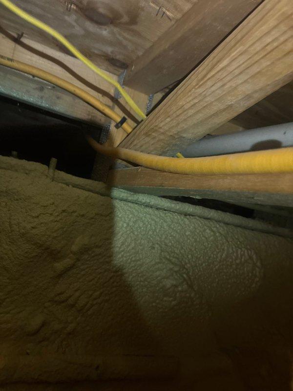 Capped gas line in kitchen per customer request. Removed and replaced existing garbage disposal with customer-supplied unit, ensuring proper electrical connections and drain line installation. Installed customer-supplied reverse osmosis water purification system under sink with dedicated faucet, completing all necessary supply line connections and drain saddle valve installation. Routed flexible gas line through attic space and properly secured with approved fasteners. Verified all connections for leaks and confirmed proper operation of all installed fixtures.