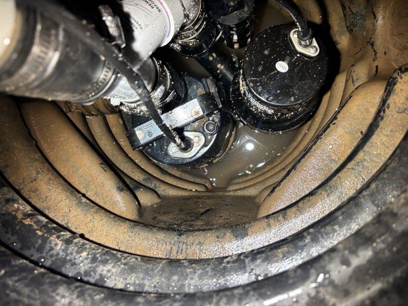 Installed a dual sump pump system in basement utility area, featuring a 1/2 HP energy-efficient permanent split capacitor primary pump with 3,540 GPH capacity at 10 ft. lift and a backup pump system rated at 1,850 GPH at 10 ft. lift. Positioned pumps in ribbed basin liner with float switch assembly, connected discharge piping to existing PVC drainage system, and verified proper operation of both primary and backup units to ensure reliable basement water management.