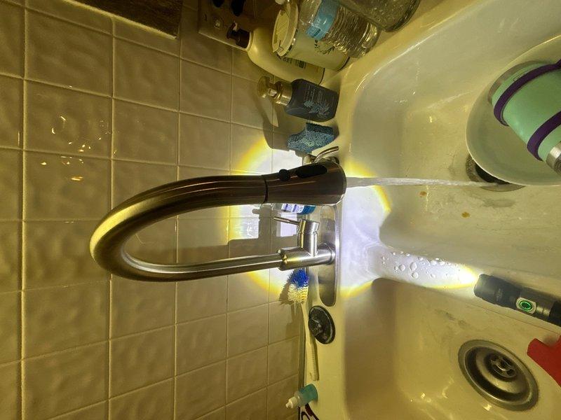 Completed preventative plumbing maintenance inspection on one unit. Inspected A.O. Smith pump motor assembly with associated piping and insulation in mechanical room, confirming proper operation and condition of components. Examined bathroom sink fixtures, faucet assembly, and water supply connections, verifying all plumbing components are functioning correctly with no leaks or deficiencies noted.