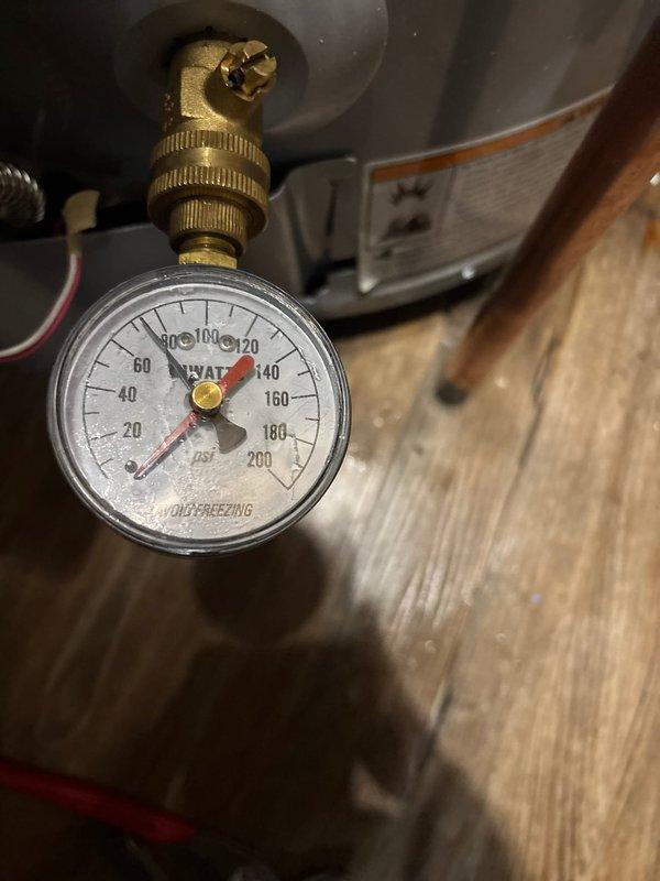 Completed installation of 50-gallon gas water heater with all required safety components and pressure regulation equipment. Installed thermal expansion tank to protect system from pressure buildup, mounted 3/4-inch pressure reducing valve (PRV) to regulate incoming water pressure, and added 3/4-inch ball valve for system isolation and maintenance access. All connections were properly fitted with brass fittings and secured according to code requirements, with pressure gauge installed to monitor system performance.
