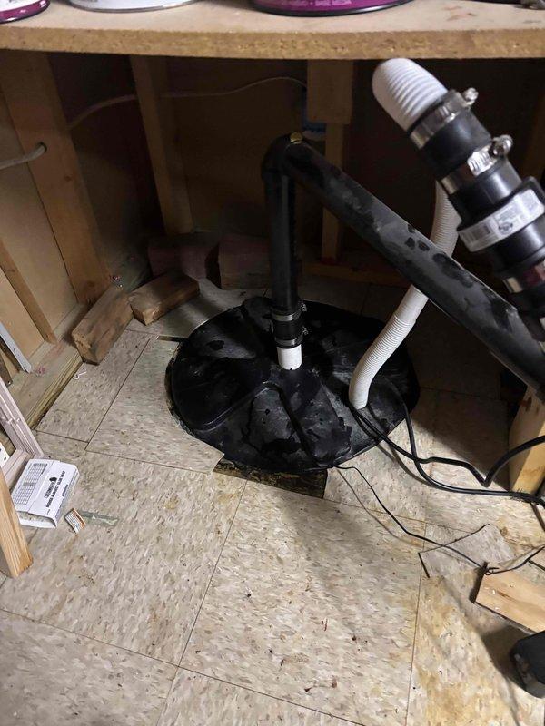 Responded to service call for sump pump making grinding noise and failing to pump water, with battery backup system also inoperative. Upon inspection, found primary sump pump motor had seized due to mechanical failure and battery backup unit was no longer holding charge. Removed failed primary pump assembly and installed new replacement sump pump unit with appropriate discharge piping connections. Replaced battery backup system with new unit, tested both primary and backup systems for proper operation and verified automatic float switch activation and water discharge functionality.