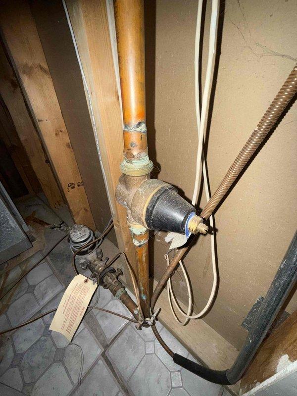 Completed annual water heater maintenance including full tank flush to remove sediment and mineral buildup. Inspected and tested pressure relief valve, verified proper operation and water pressure readings on system gauge. Checked and adjusted temperature settings to manufacturer specifications for optimal performance and safety. All plumbing connections, pressure regulator assembly, and associated components inspected and found to be functioning properly with no leaks detected.