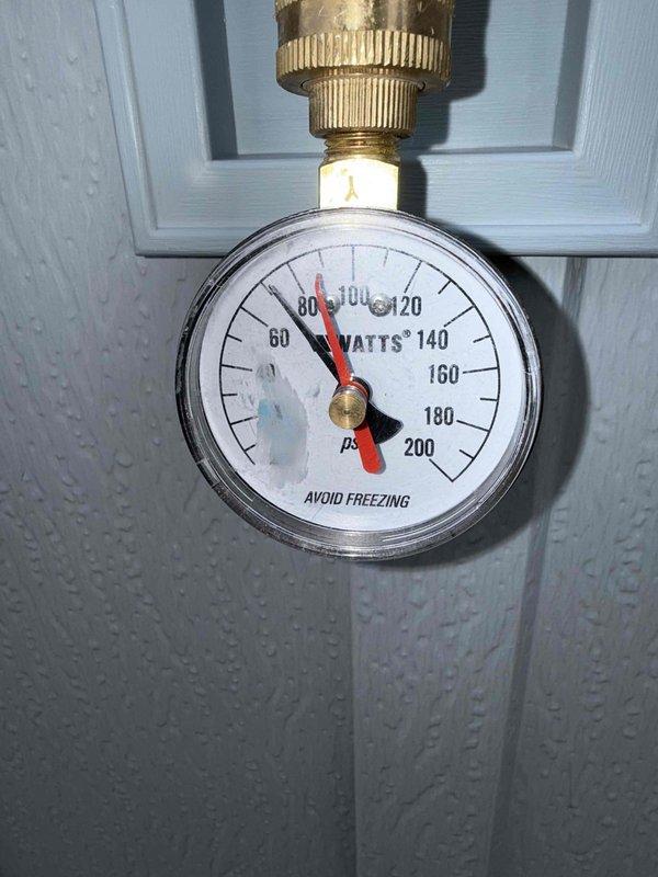 Completed annual water heater maintenance including full tank flush to remove sediment and mineral buildup. Inspected and tested pressure relief valve, verified proper operation and water pressure readings on system gauge. Checked and adjusted temperature settings to manufacturer specifications for optimal performance and safety. All plumbing connections, pressure regulator assembly, and associated components inspected and found to be functioning properly with no leaks detected.