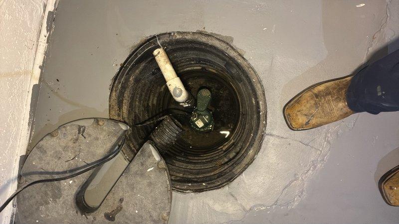 Conducted site assessment for bathroom addition estimate at property scheduled for closing. Documented existing plumbing infrastructure including sump pump basin with operational pump and discharge piping, and inspected basement ceiling structure for potential routing of new water supply and drain lines. Property evaluation completed to provide estimate for bathroom installation to be performed after closing date.