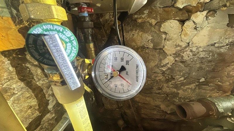 Completed preventive plumbing maintenance on residential water heating system including Rinnai tankless unit. Inspected all visible piping, valves, pressure gauges, and connections in mechanical room. Verified proper operation of gas line valves, manifold assemblies, and pressure regulation equipment. All components found to be functioning within normal parameters with no leaks detected.