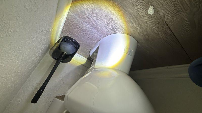 Responded to service call for toilet not filling properly in hallway bathroom nearest to kitchen. Upon inspection, diagnosed issue with fill valve mechanism preventing proper water flow into tank. Repaired fill valve assembly to restore normal toilet operation and verified proper filling cycle and water level upon completion.
