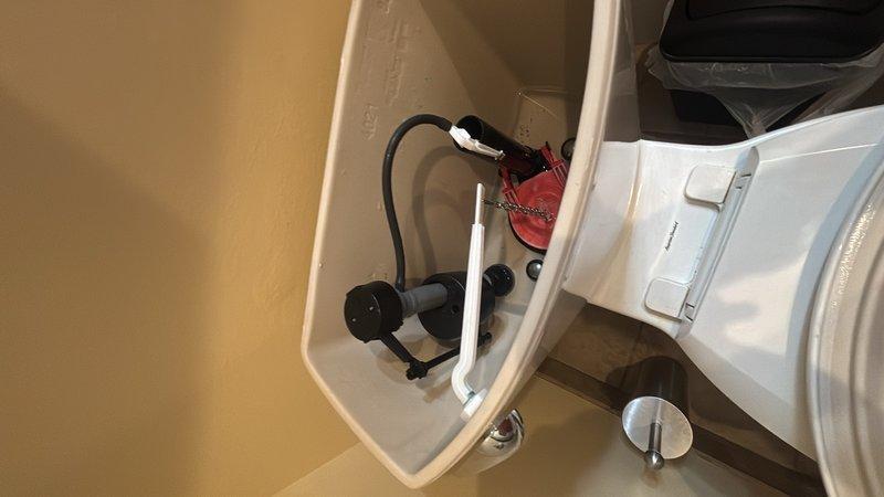 Responded to multiple plumbing issues throughout the residence. Addressed leaking faucet at bathroom vanity with modern single-handle fixture over granite countertop. Serviced malfunctioning shut-off valves that would not close completely, including outdoor shut-off valve. Repaired toilet fill valve assembly to restore proper water refilling function in bowl and tank.
