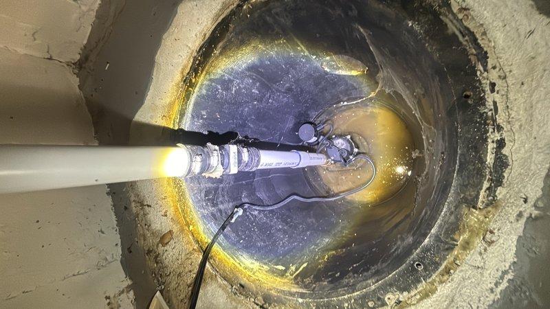 Responded to service call for basement flooding concerns during storm events. Performed comprehensive inspection of existing sump pump system and pit assembly. Found pump operational but inadequate discharge capacity for current water infiltration rates. Standing water observed in sump basin with sediment accumulation affecting pump efficiency. Assessed pump placement, float switch operation, and discharge line configuration. Recommended system upgrade to higher capacity pump unit and verified proper pit drainage to prevent future water retention issues during heavy rainfall.