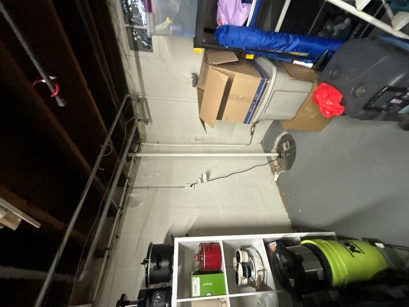 Responded to service call for basement flooding concerns during storm events. Performed comprehensive inspection of existing sump pump system and pit assembly. Found pump operational but inadequate discharge capacity for current water infiltration rates. Standing water observed in sump basin with sediment accumulation affecting pump efficiency. Assessed pump placement, float switch operation, and discharge line configuration. Recommended system upgrade to higher capacity pump unit and verified proper pit drainage to prevent future water retention issues during heavy rainfall.