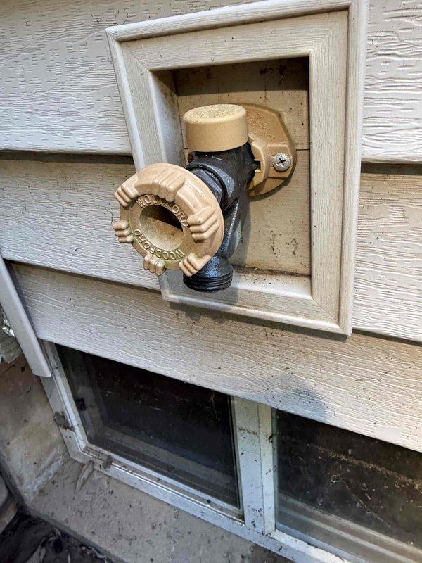 Responded to emergency flooding situation in basement following recent storms. Installed new sump pump system to address water accumulation and prevent further basement flooding. Verified proper drainage through exterior discharge lines, including PVC piping routed away from foundation to appropriate outdoor drainage area. Tested system operation to ensure water is properly evacuated from basement window well and interior space. Confirmed all connections are secure and discharge lines are functioning correctly to prevent future water intrusion.