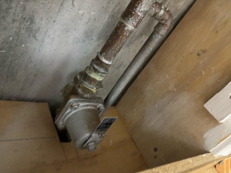 Conducted comprehensive assessment of existing 50-gallon water heater installation in basement location. Inspection revealed severely corroded plumbing connections and aged piping system with extensive rust accumulation on metal fittings, valves, and supply lines. Evaluated current water heater unit, gas control valve assembly, and connection points to determine replacement specifications. Provided detailed estimate for new 50-gallon water heater installation including removal of existing unit and assessment of necessary upgrades to associated plumbing infrastructure due to deteriorated condition of existing pipes and fittings.