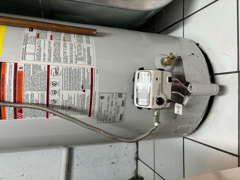 Conducted comprehensive assessment of existing 50-gallon water heater installation in basement location. Inspection revealed severely corroded plumbing connections and aged piping system with extensive rust accumulation on metal fittings, valves, and supply lines. Evaluated current water heater unit, gas control valve assembly, and connection points to determine replacement specifications. Provided detailed estimate for new 50-gallon water heater installation including removal of existing unit and assessment of necessary upgrades to associated plumbing infrastructure due to deteriorated condition of existing pipes and fittings.