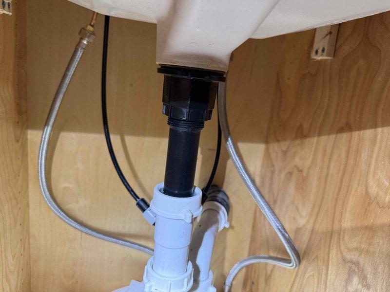 Installed two customer-supplied faucets in collaboration with related job activities. Completed under-sink plumbing connections including drain assemblies, tailpieces, and flexible braided supply lines for both hot and cold water. All components were properly secured with slip nuts and fittings, ensuring leak-free operation and code-compliant installation.