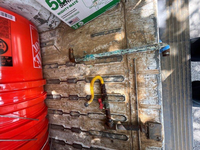 Responded to water leak at hot water heater location. Upon inspection, identified compromised water supply line connection near the unit. Repaired the leaking water line using appropriate copper fittings and connections. Verified all piping connections were secure and tested system for proper operation with no additional leaks detected upon completion.