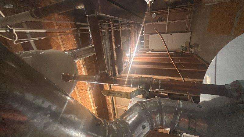 Conducted site assessment in basement for 50-gallon water heater replacement estimate. Inspected existing 10-year-old unit, evaluated installation location, accessibility, and surrounding plumbing connections. Documented current configuration and workspace conditions to provide accurate equipment and labor quote for single unit replacement.